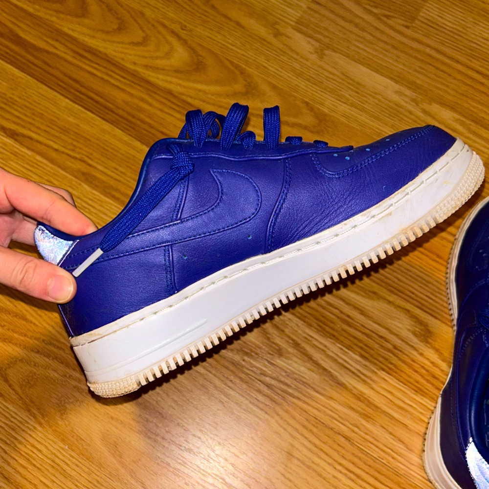 Dark blue leather Nike 1’s women size 6. Gently worn!